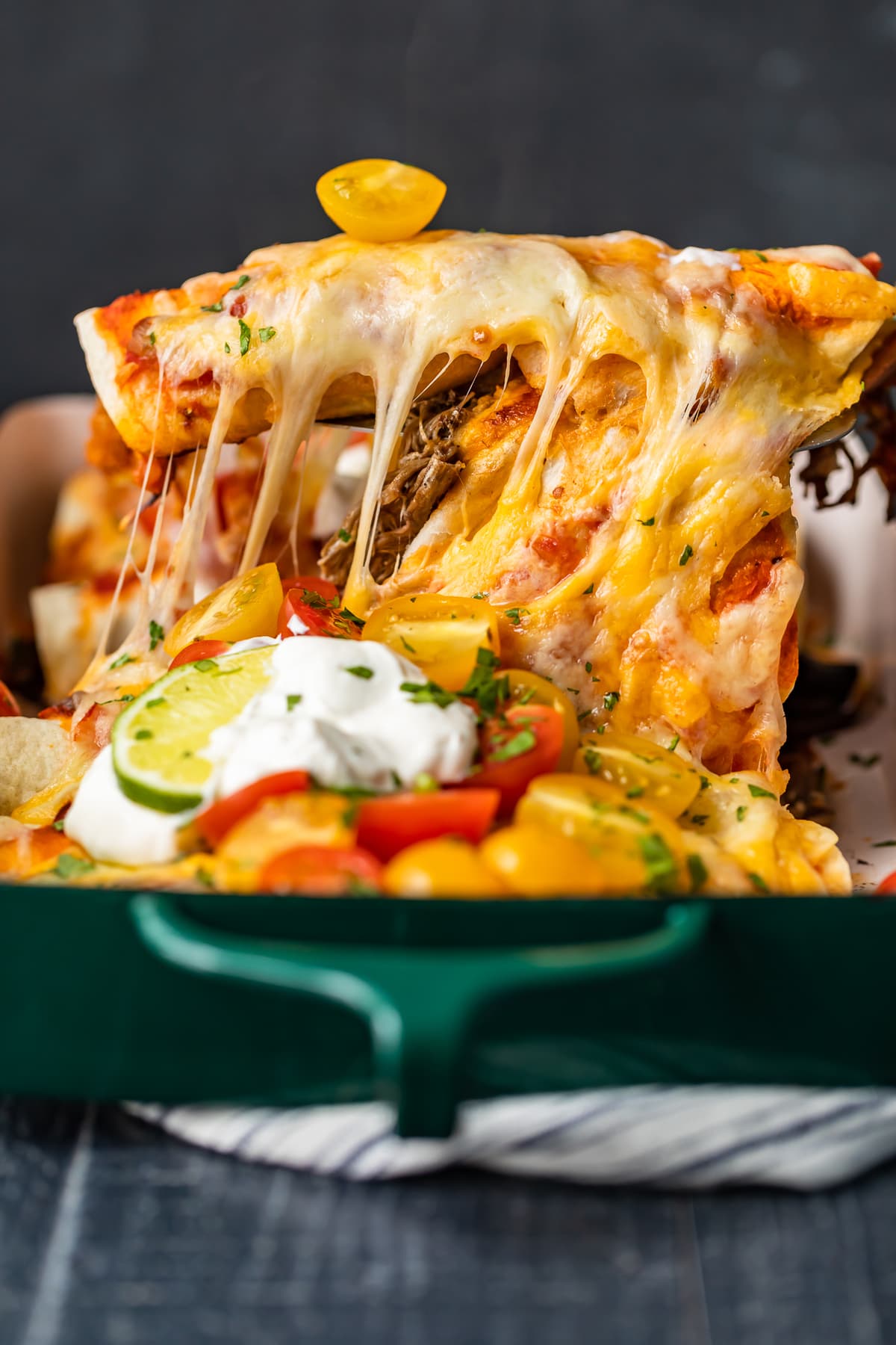 enchiladas filled with shredded beef and cheese