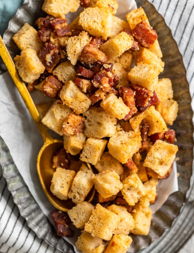 Bacon croutons are the perfect way to add some extra flavor to any soup or salad. This homemade croutons recipe is so easy to make! Baked croutons with the added taste of bacon. What could be better?!
