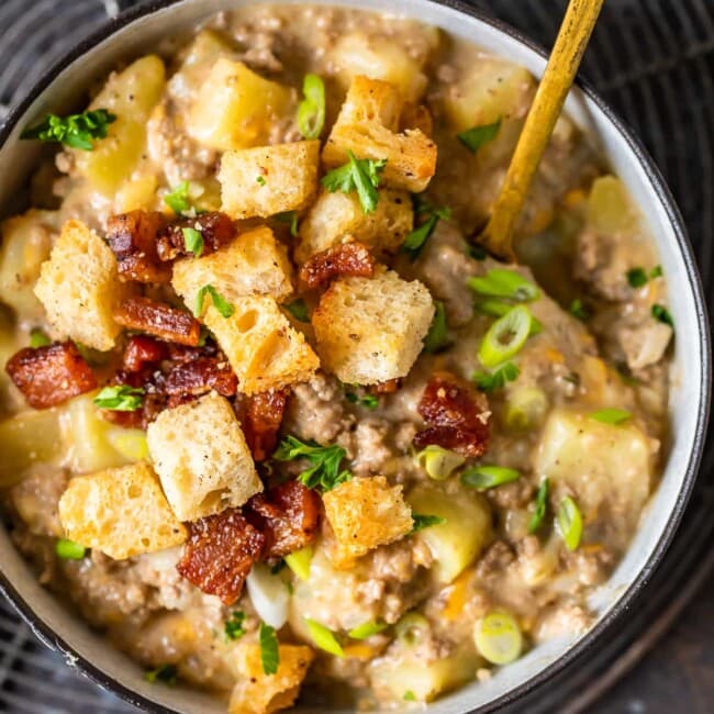 Cheeseburger Soup is a savory, delicious soup with classic all-American flavors. This Bacon Cheeseburger Soup Recipe is filled with everything you'd expect from a good cheeseburger, plus topped with homemade bacon croutons. Easy to make, hard to stop eating!