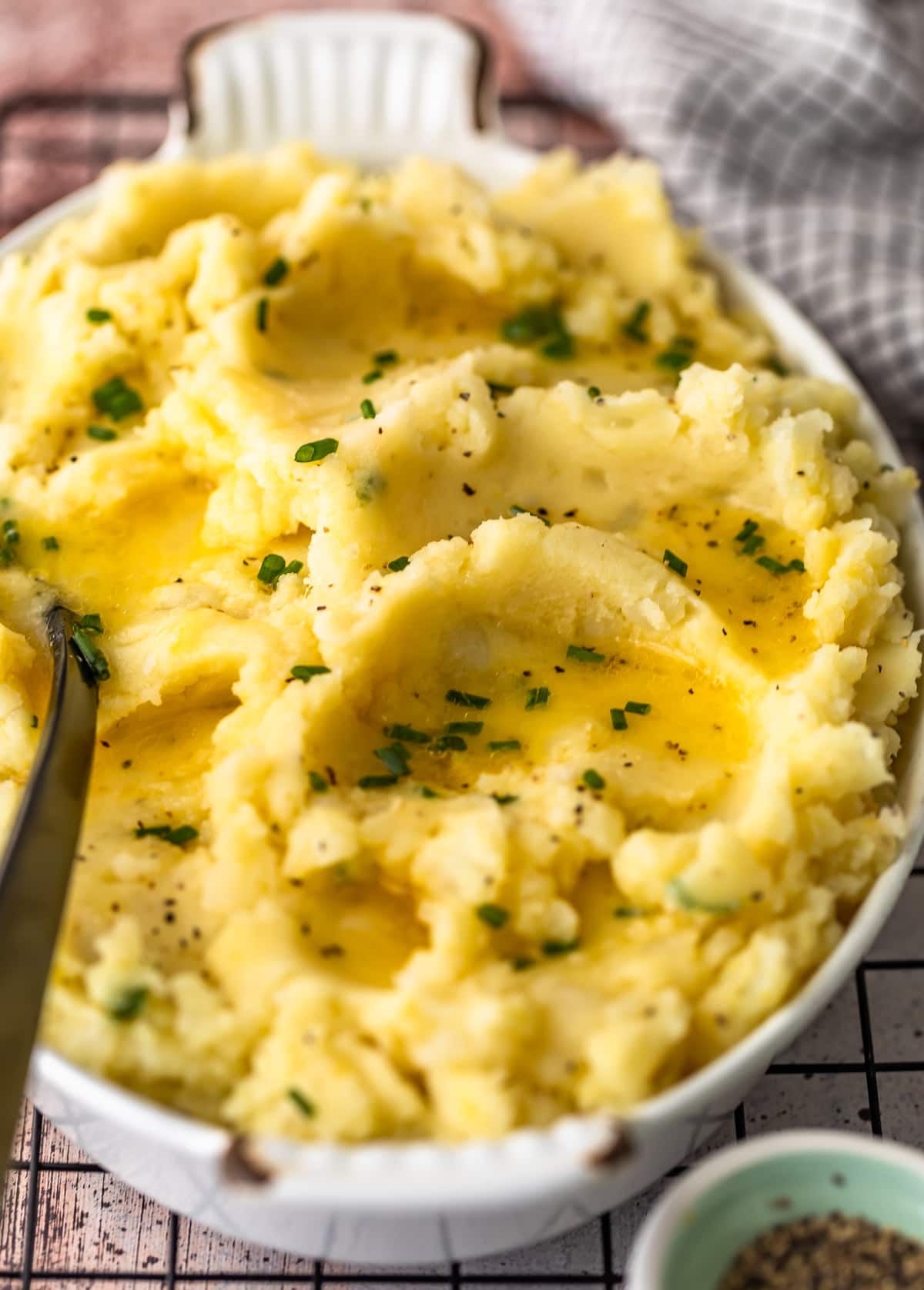 creamy potatoes in a white serving dish