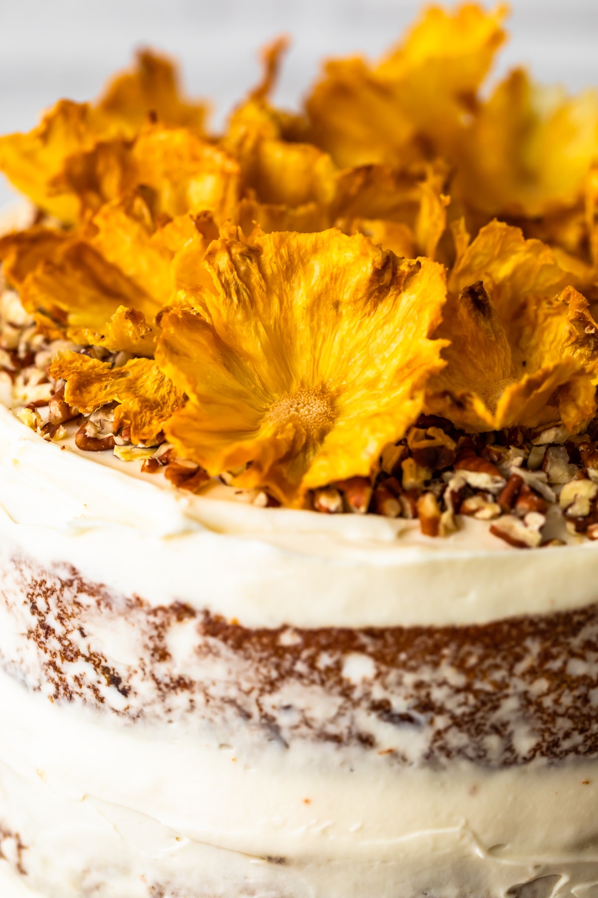 dried pineapple flowers on a cake