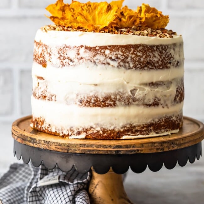 Hummingbird Cake is a sweet and delicious dessert for any occasion. This beautiful banana pineapple cake with cream cheese frosting is a popular Southern cake recipe that everyone should try. Make this Hummingbird Cake recipe (with pineapple flowers) for Easter, bridal showers, and more!