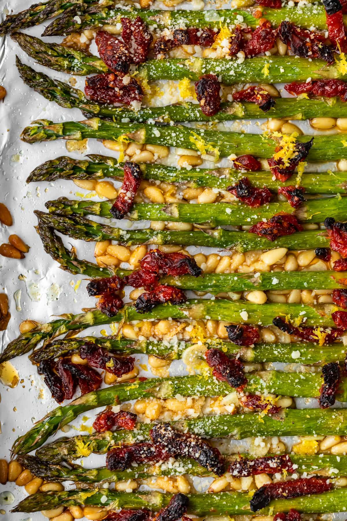 oven roasted asparagus with sun dried tomatoes pine nuts and garlic