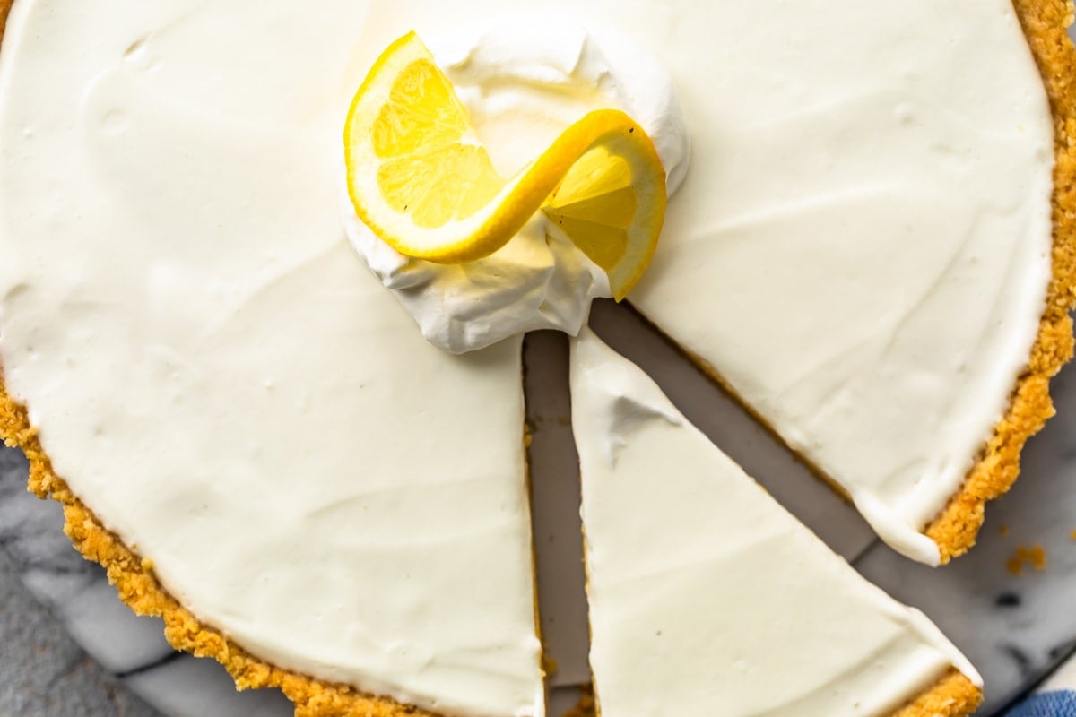 lemon pie with one slice cut out
