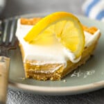 Sour Cream Lemon Pie is perfectly tart and creamy. This easy lemon pie recipe is filled with simple flavors that mix together beautifully. The lemon pie filling, saltine cracker pie crust, and sour cream topping combine to create the most delicious lemon tart for spring time!