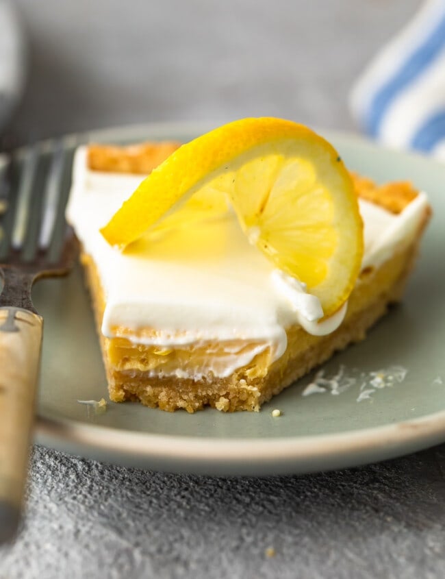 Sour Cream Lemon Pie is perfectly tart and creamy. This easy lemon pie recipe is filled with simple flavors that mix together beautifully. The lemon pie filling, saltine cracker pie crust, and sour cream topping combine to create the most delicious lemon tart for spring time!