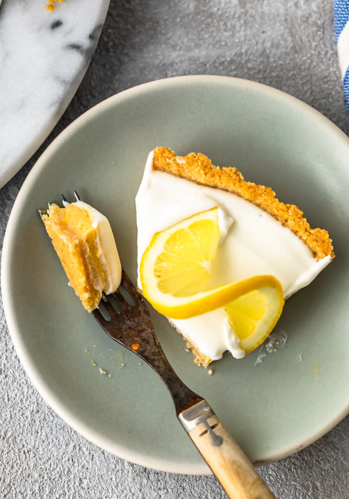 slice of lemon tart on a plate