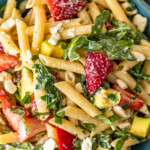 Strawberry Avocado Pasta Salad is an easy and tasty summer pasta salad recipe that everyone will love! This penne pasta salad with feta, strawberries, avocado, poppy seed dressing and more is so light and fresh. Serve it warm or serve it cold, either way, it's sure to be a hit!