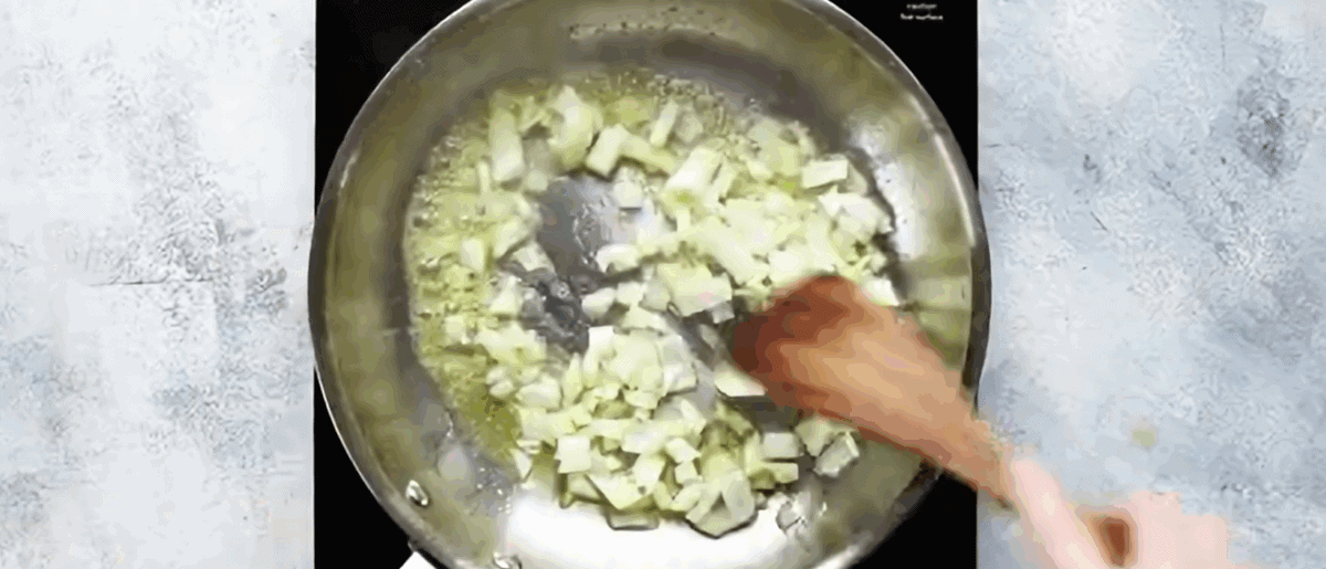 Sauteeing onion in butter and olive oil. 