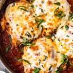 Chicken Parmesan is a classic dish that seems to be loved by all. This crispy chicken parm is the BEST Chicken Parmesan recipe ever. It's so easy and so delicious. Make it for an easy weeknight dinner, or a special occasion!