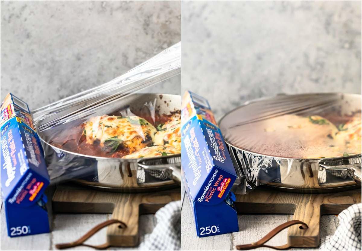 Chicken Parmesan is a classic dish that seems to be loved by all. This crispy chicken parm is the BEST Chicken Parmesan recipe ever. It's so easy and so delicious. Make it for an easy weeknight dinner, or a special occasion! a skillet covered with plastic wrap