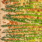 Garlic Asparagus is an easy side dish for any meal. This CRISPY garlic roasted asparagus recipe is both healthy and flavorful. Baked with panko breadcrumbs, garlic, cheese, and olive oil, this is a dish everyone is sure to love. If that's not enough, our garlic parmesan asparagus is topped off with homemade garlic aioli!