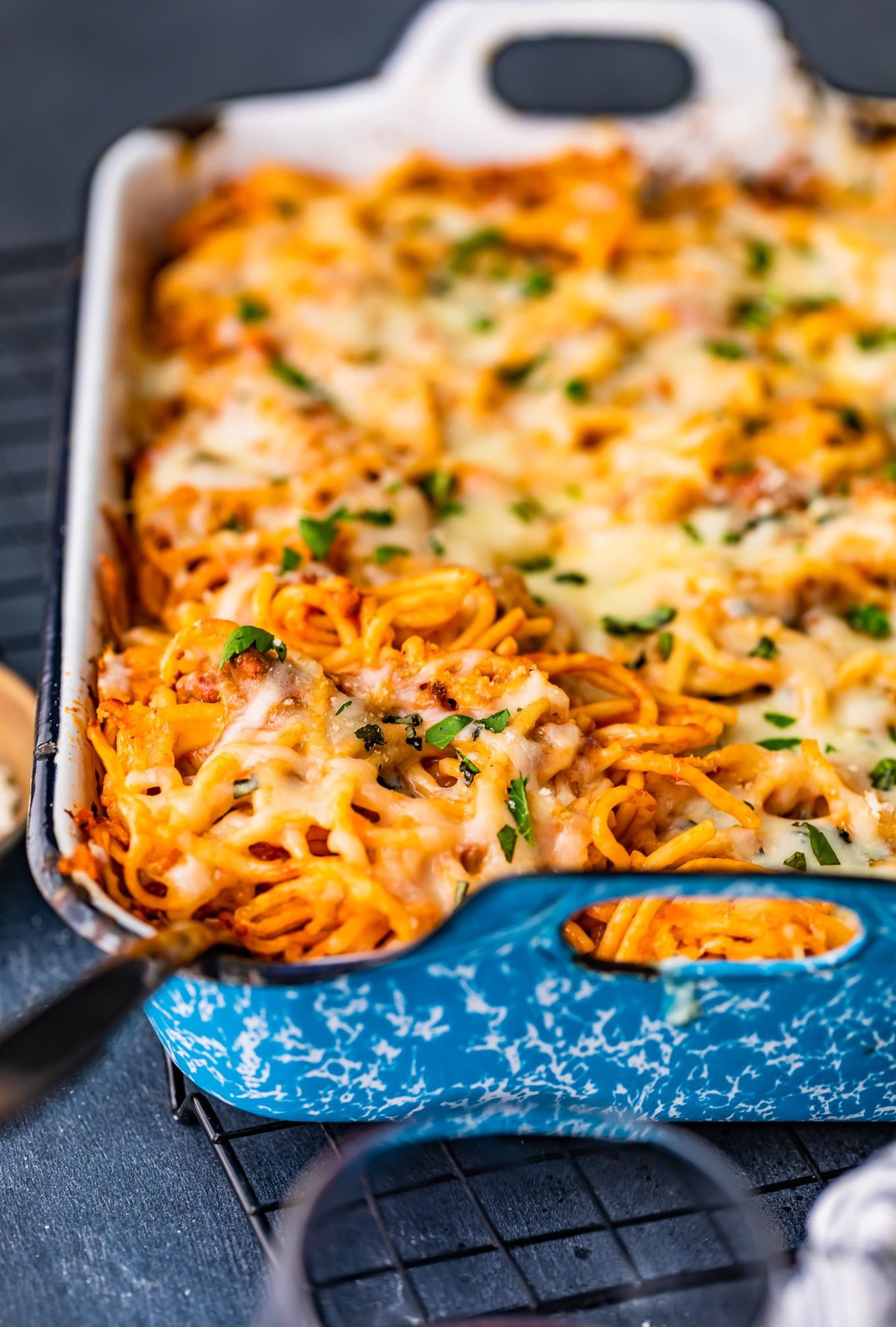 casserole dish filled with baked spaghetti 