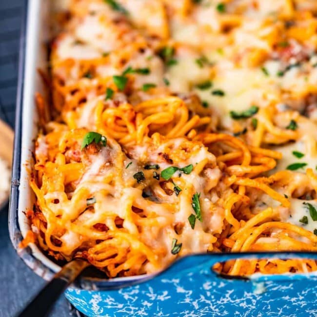 Baked Spaghetti is a cheesy, tasty, easy dinner for any night of the week. This super easy baked spaghetti recipe is something the whole family is sure to love!