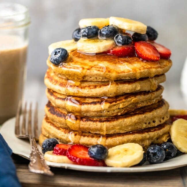 Banana Pancakes are a simple, tasty, healthy recipe you can make for breakfast every morning! These dairy free pancakes are made with almond milk, bananas, oats, and lots of other good stuff. Healthy pancakes for a delicious breakfast! You're going to LOVE this easy banana pancake recipe.