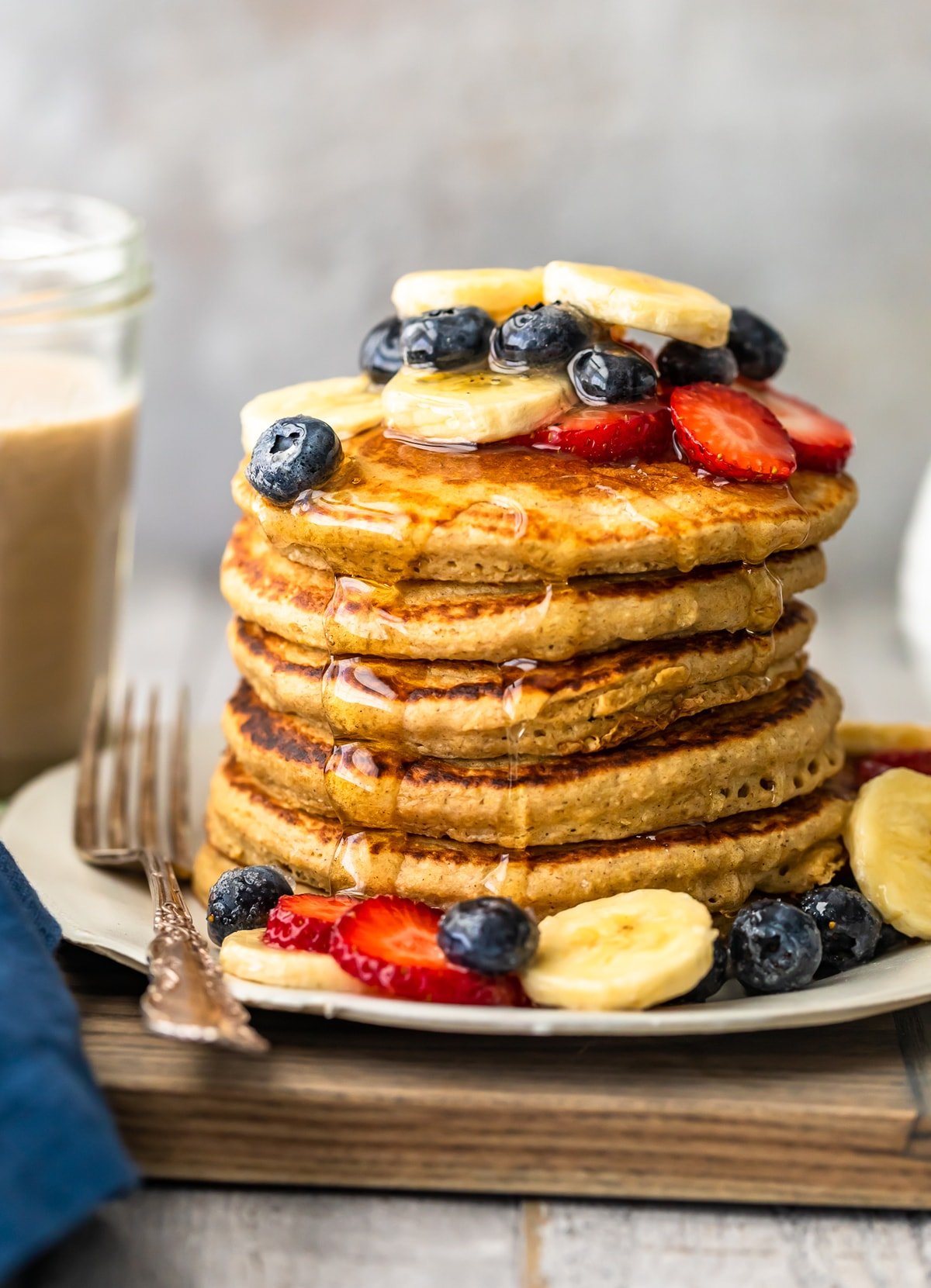 easy banana pancakes with honey on a plate