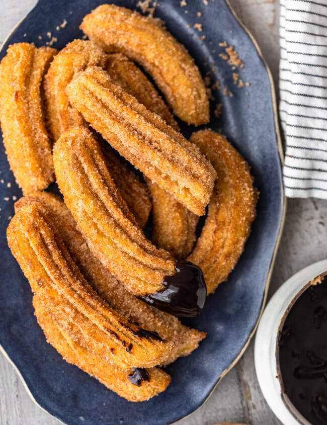 Churros are one of the best treats ever, and this easy churros recipe means you can make them at home any time you want. Better yet, they're gluten free! Dip these fried cinnamon sugar snacks in chocolate sauce for the ultimate delight!