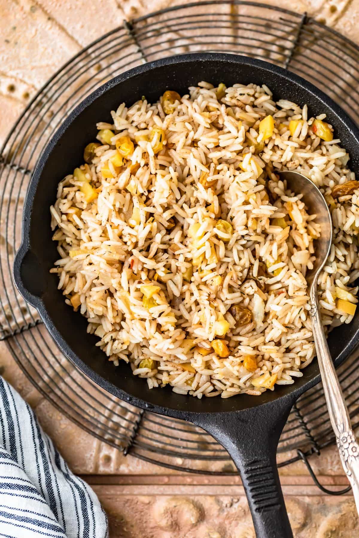 A bowl of food, with Rice and Pilaf