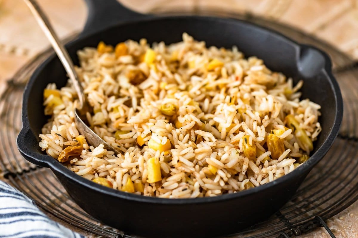 rice with apples and raisins in a skillet