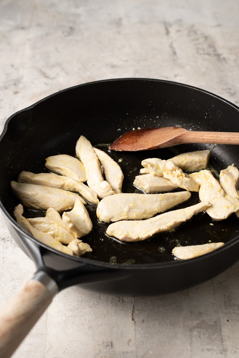 Browning chicken in a skillet