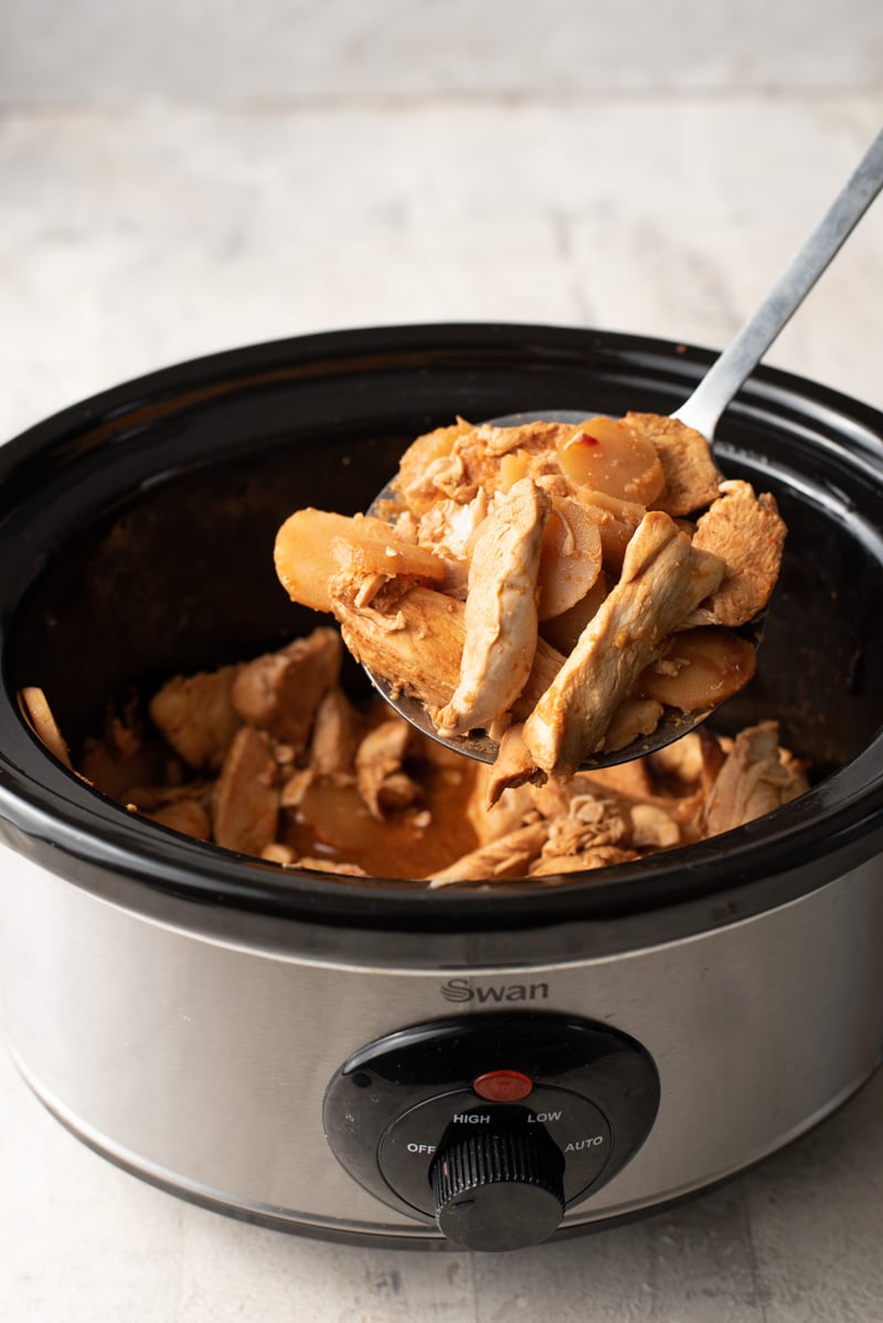 Cooked cashew chicken in a slow cooker