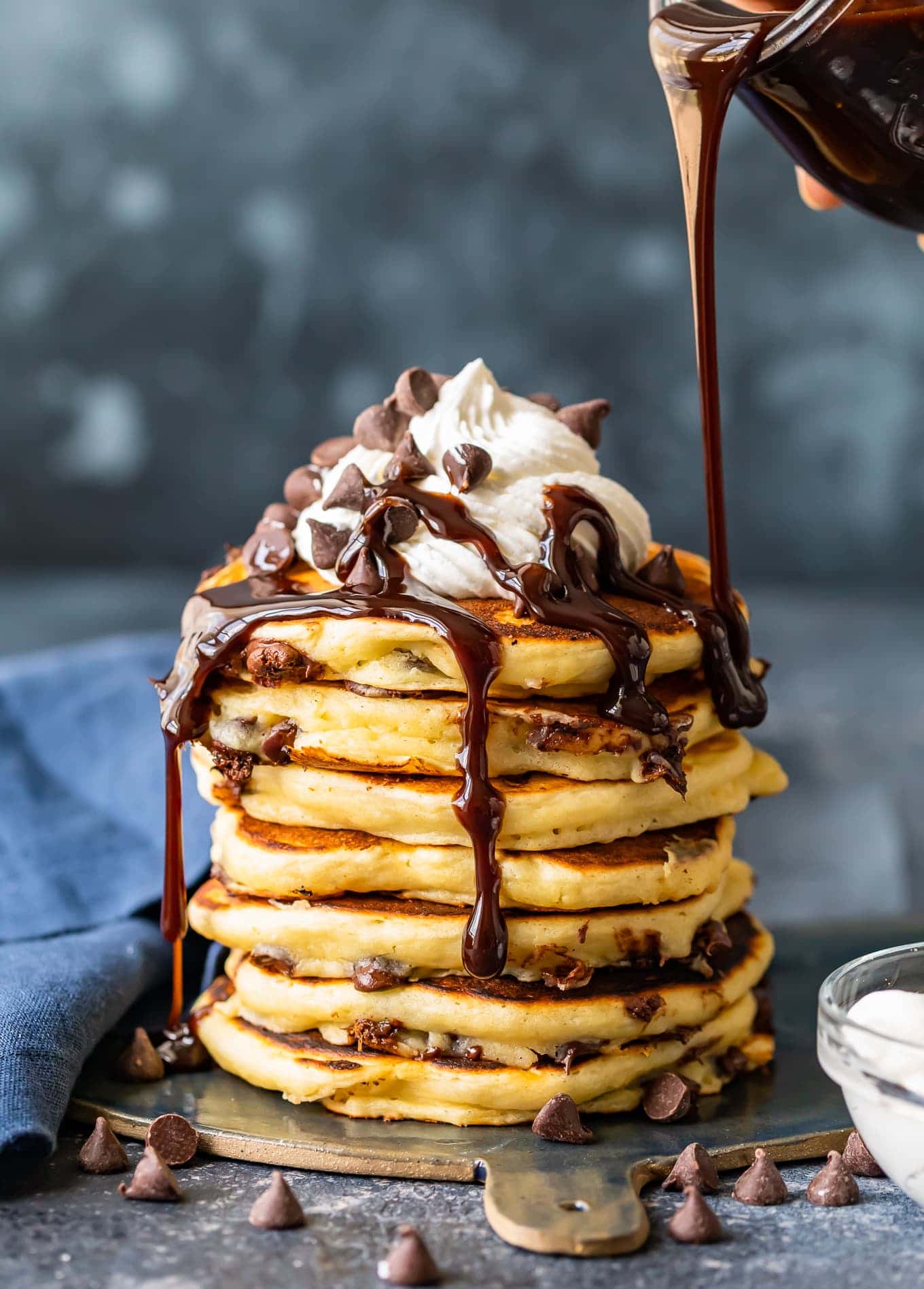 chocolate syrup drizzled over pancakes