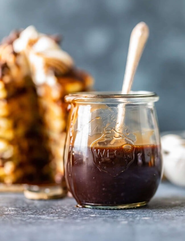 chocolate syrup in a glass with spoon