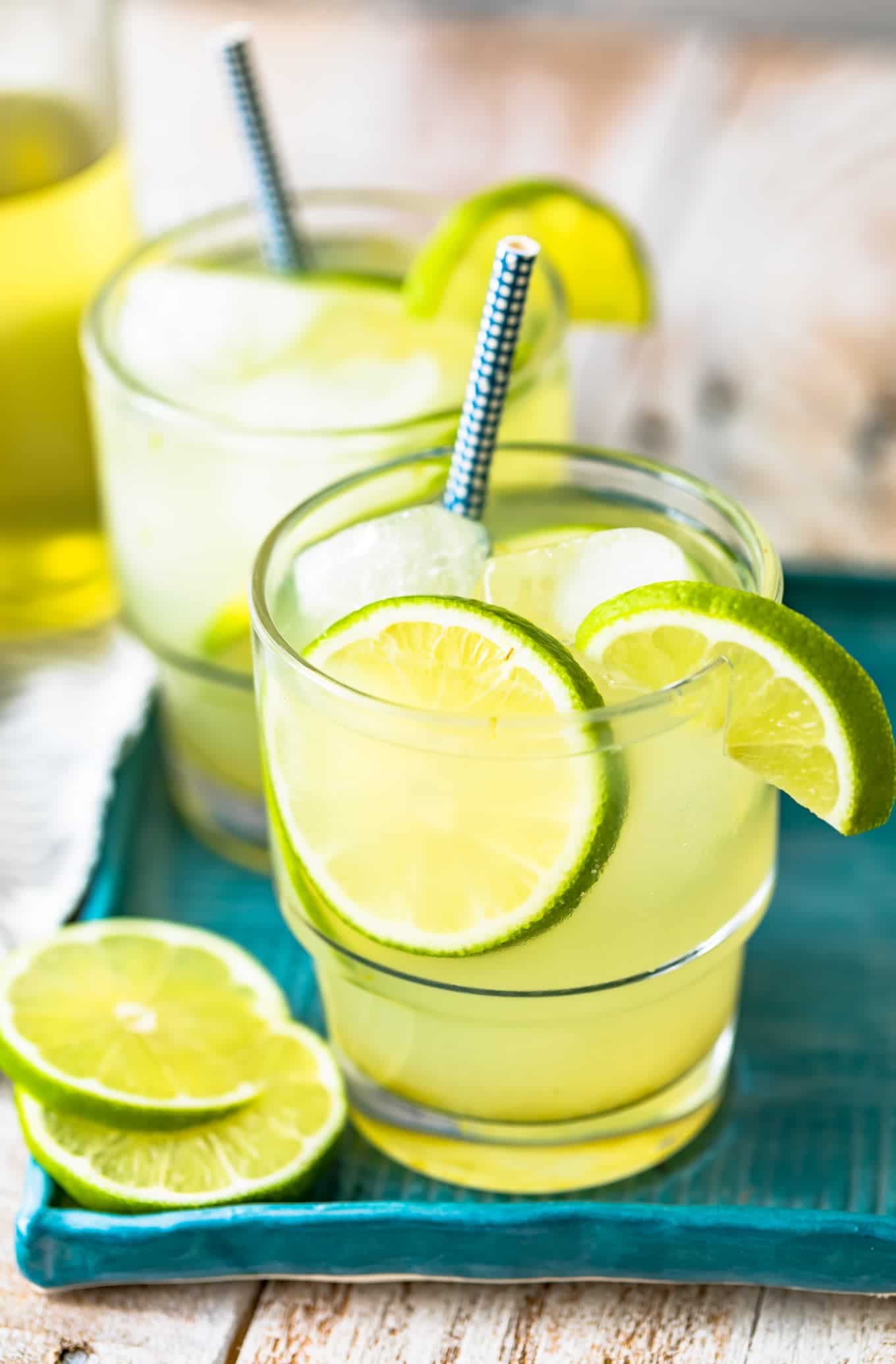 glasses of limeade with straws