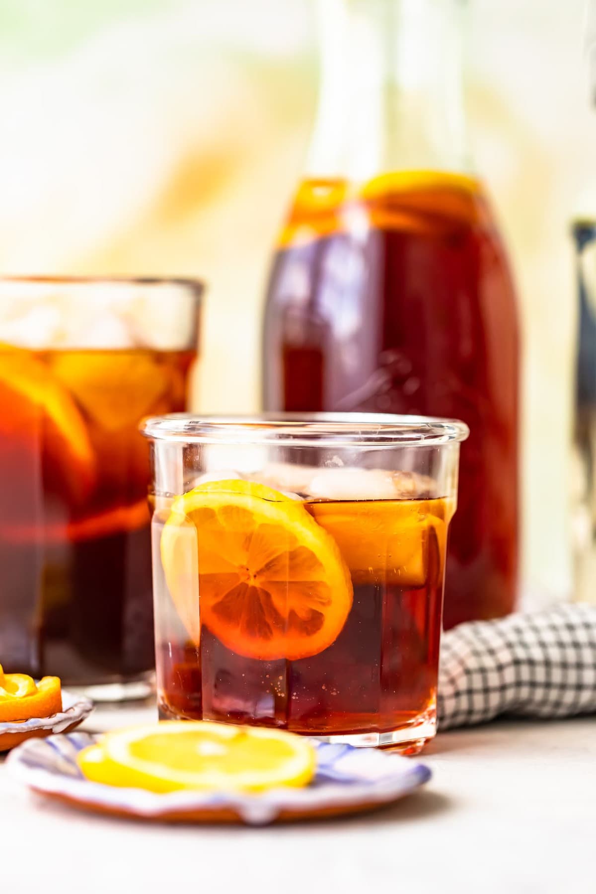 Homemade sweet tea served in a glass with a lemon slice