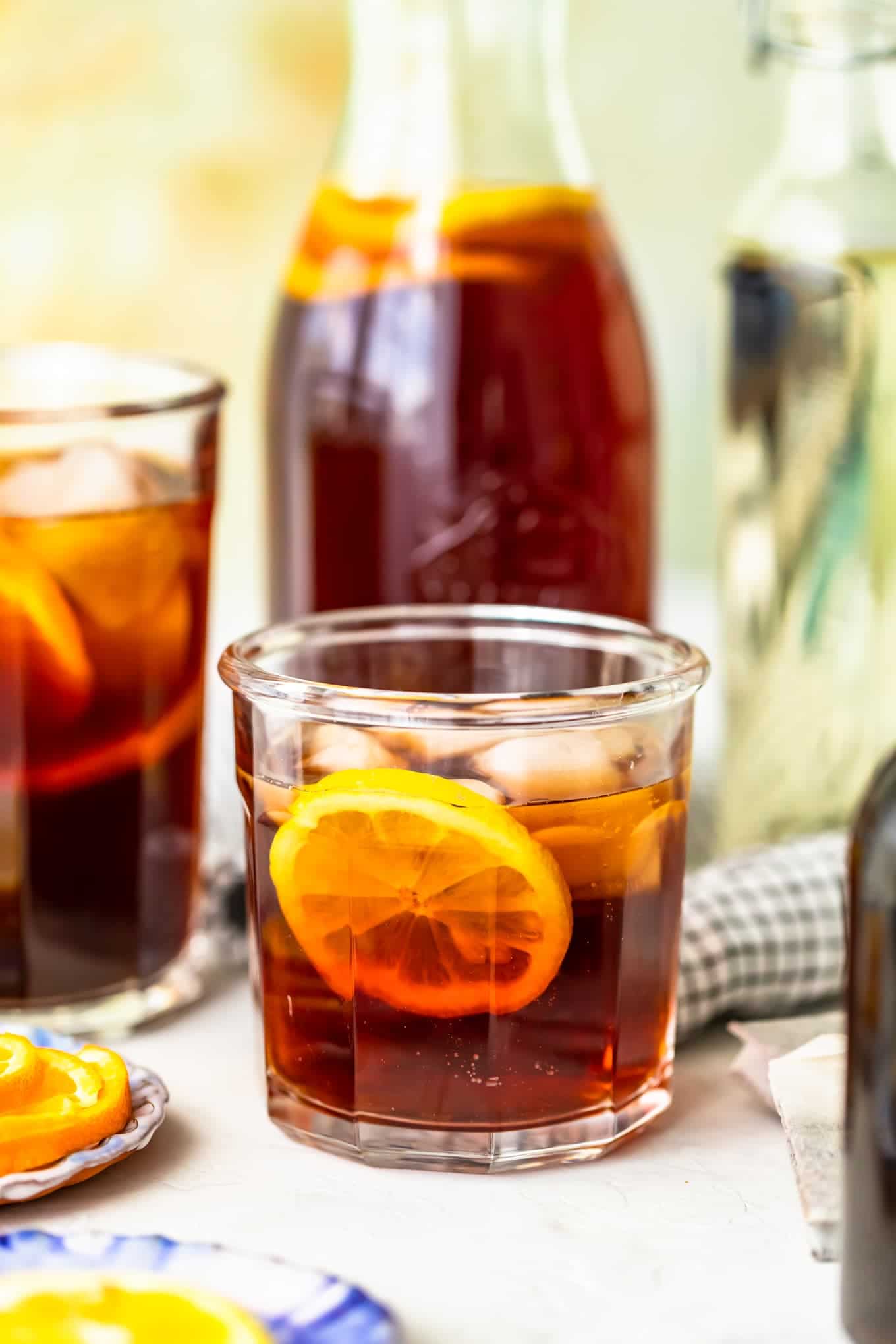 Homemade sweet tea in a glass and a pitcher