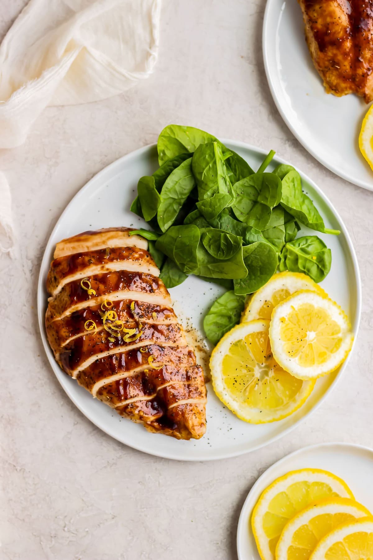 plate of chicken breast and spinach