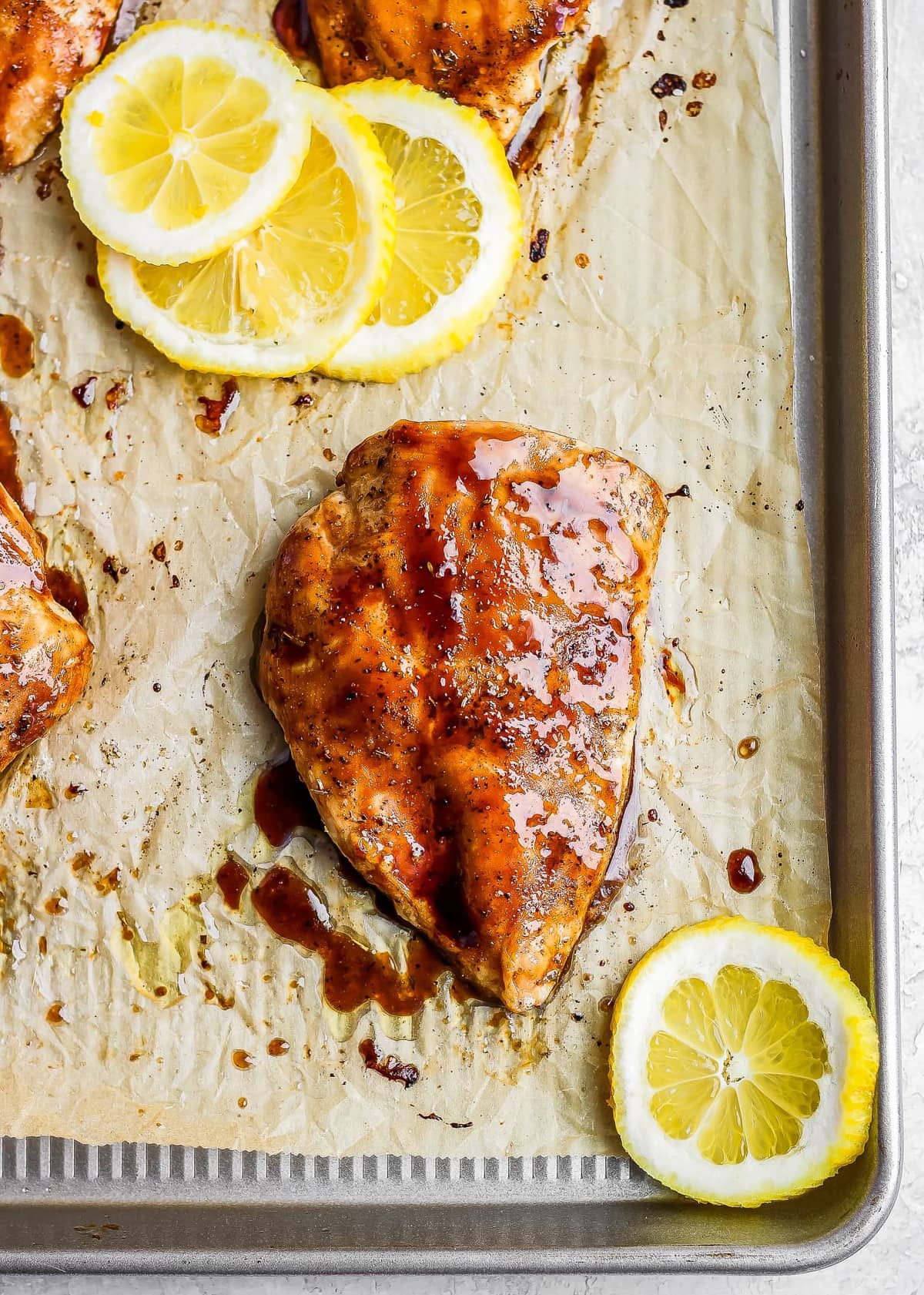 balsamic chicken on a baking sheet