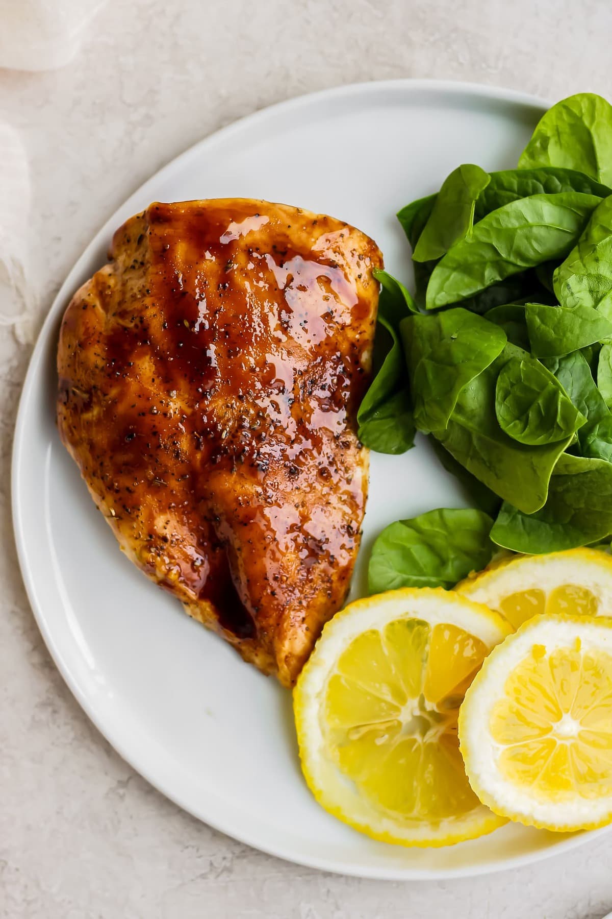 balsamic glazed chicken breast on a plate