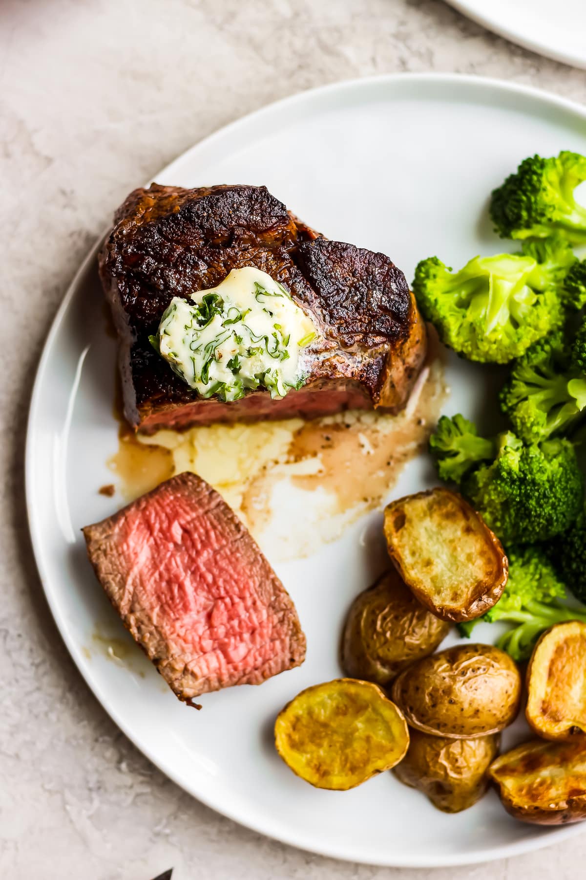 overhead view of steak and veggies on a plate