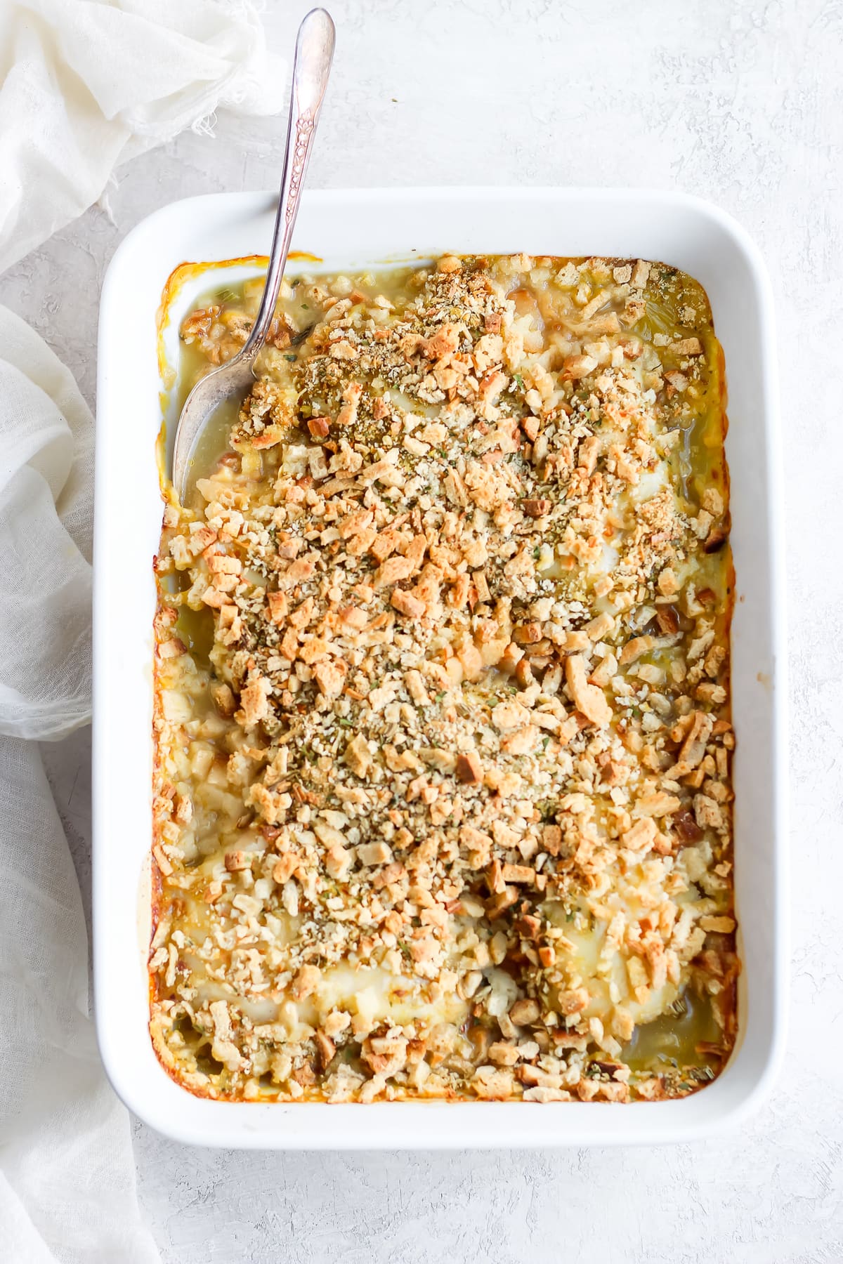 creamy chicken bake in a white casserole dish