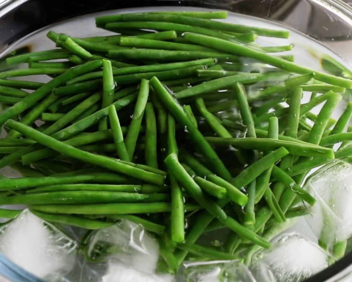 green beans being blanched in water