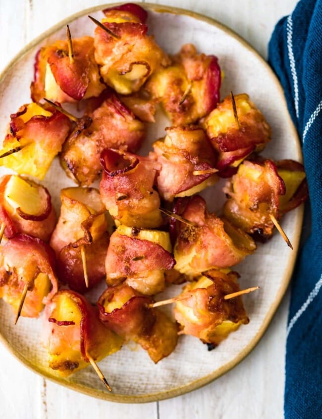 bacon wrapped pineapple on plate