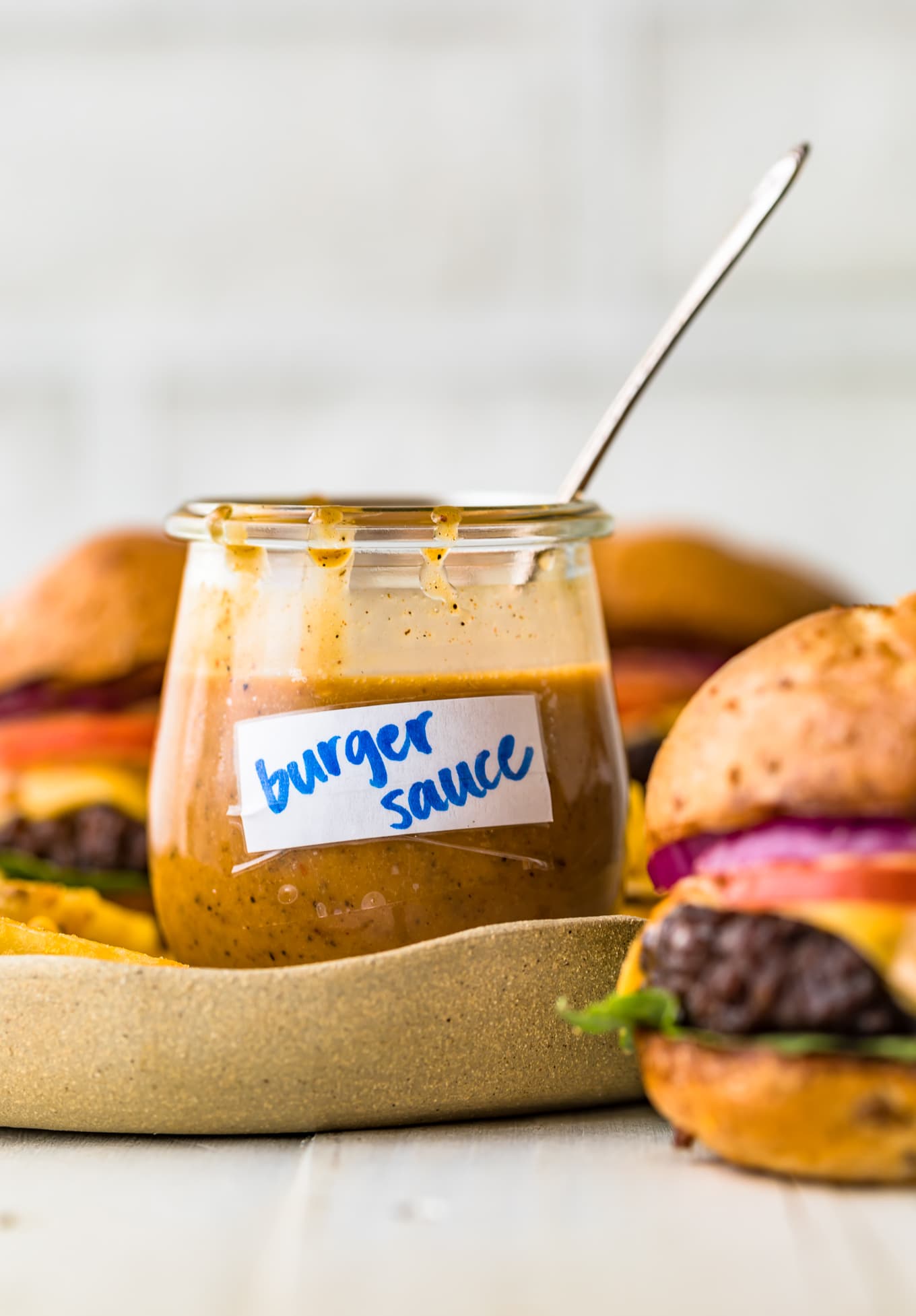 A jar of the best burger sauce with a spoon