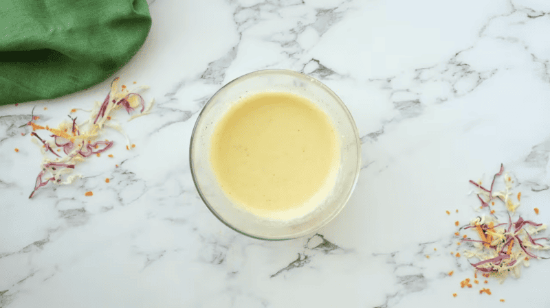 yellow liquid in a glass bowl.