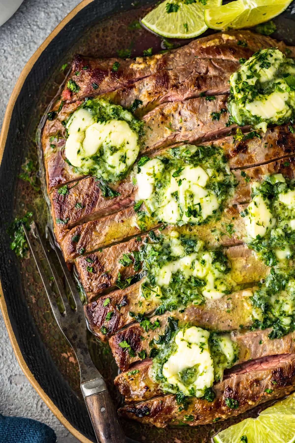 flank steak topped with butter