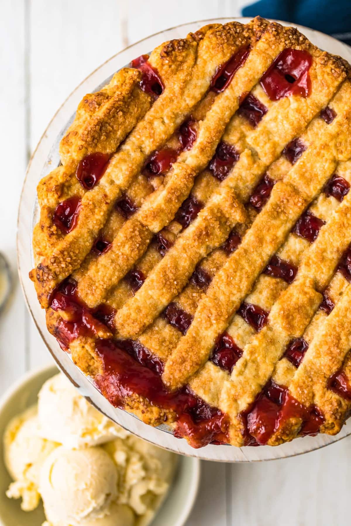 A homemade cherry pie with a lattice top