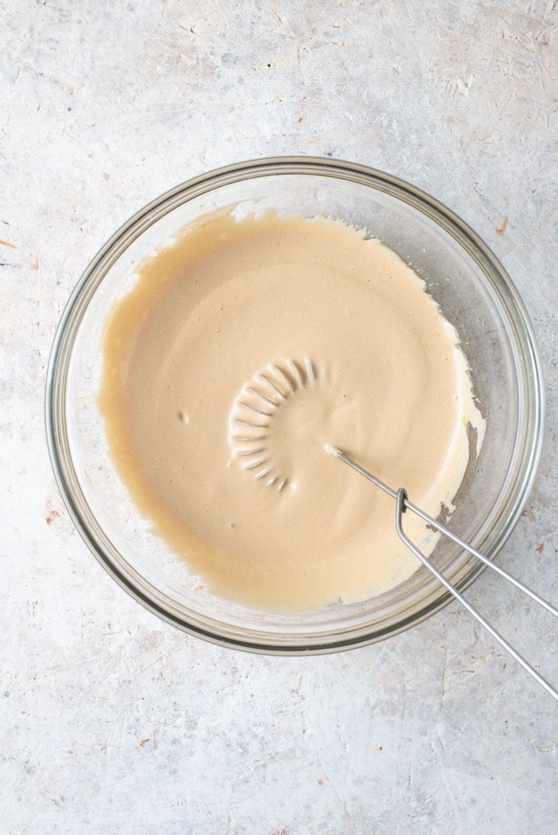 Cheesy bruschetta chicken sauce in a bowl