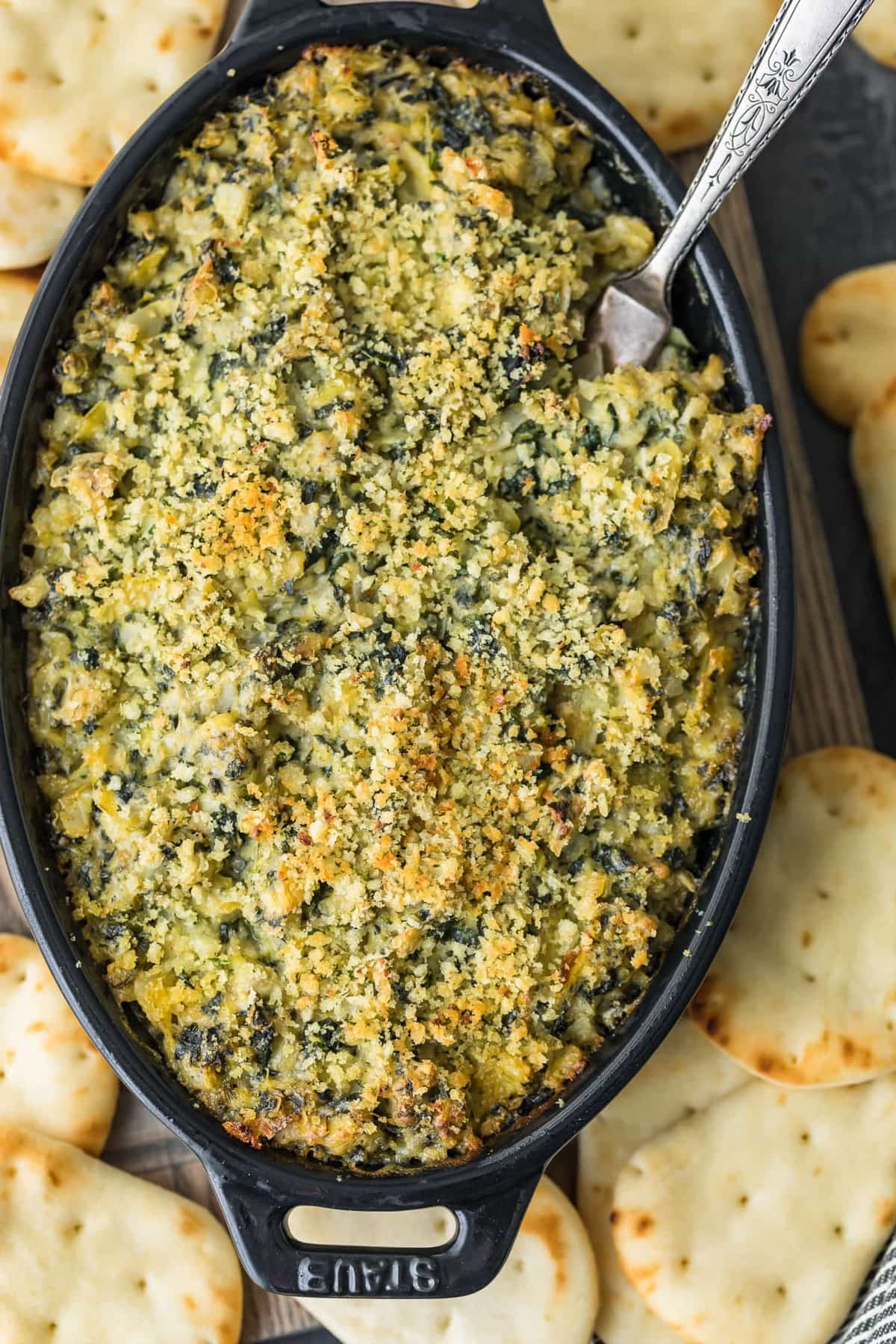 Baked Spinach Artichoke Dip served with crackers