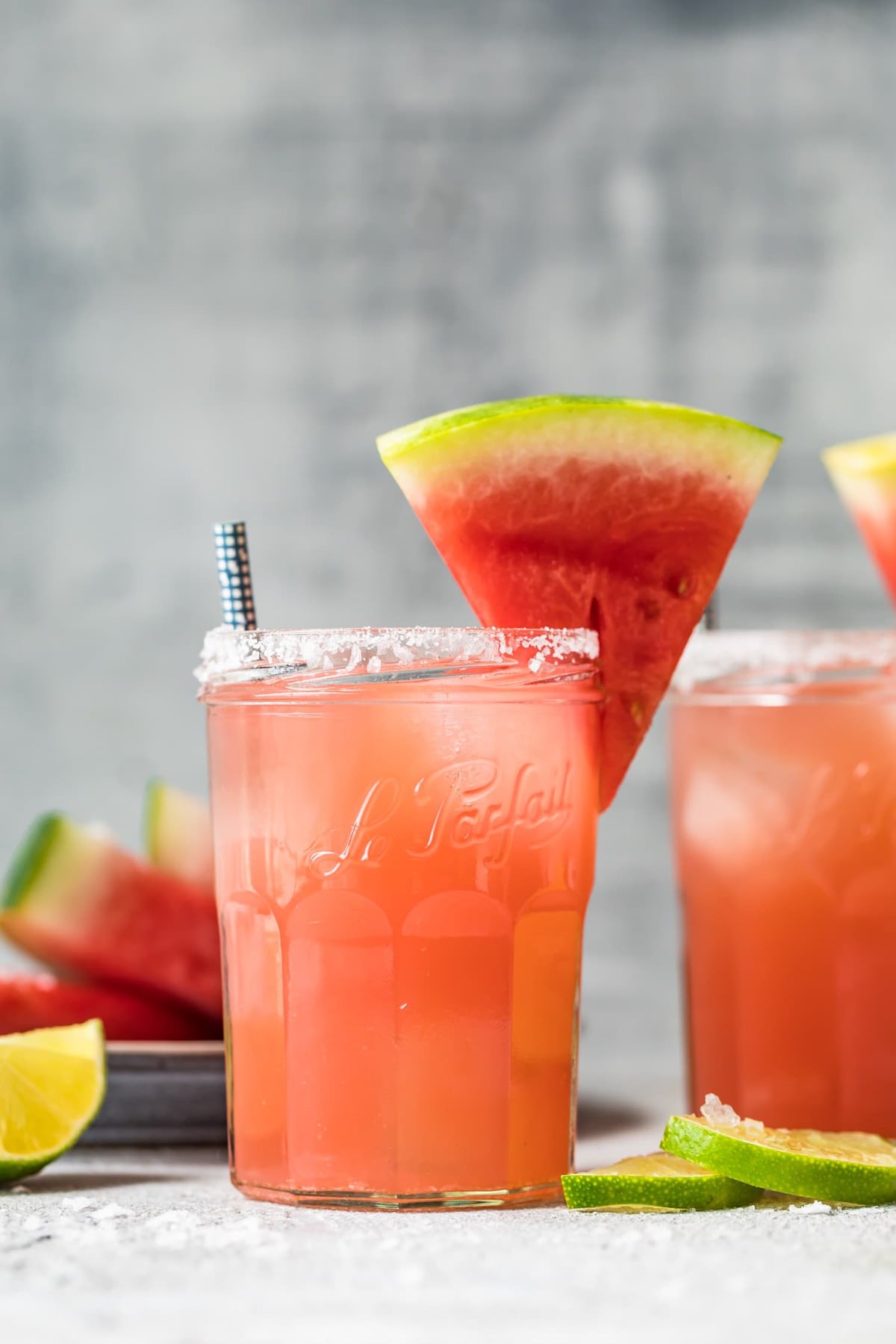 margarita in a glass with a salted rim and a slice of watermelon