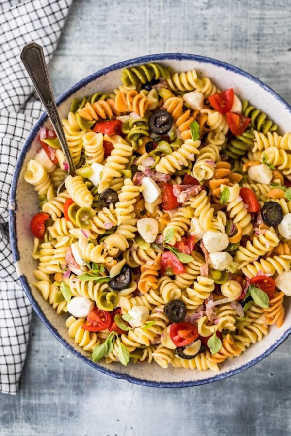 italian pasta salad in a bowl with a spoon