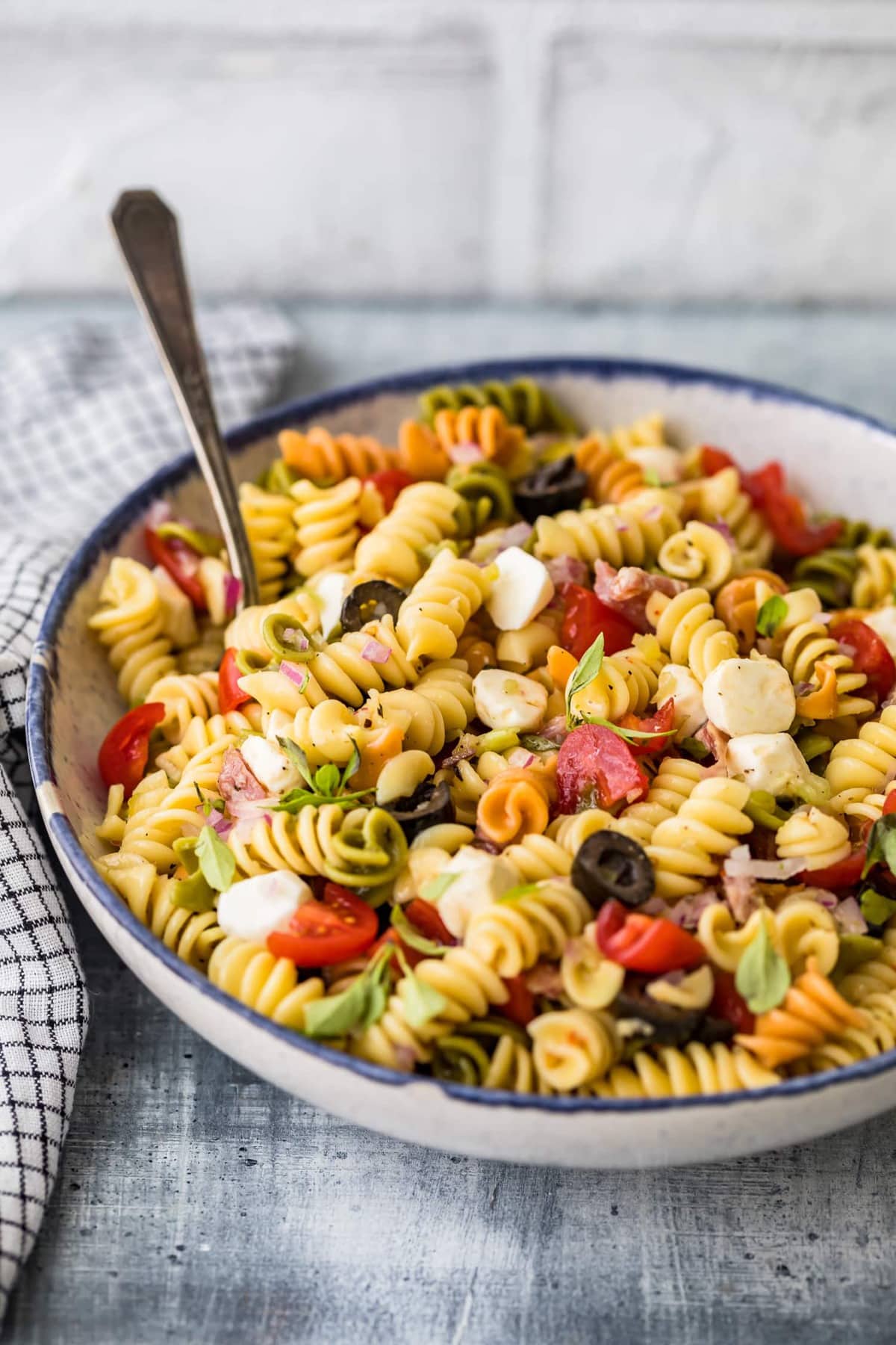 Mixed pasta served in a large white bowl