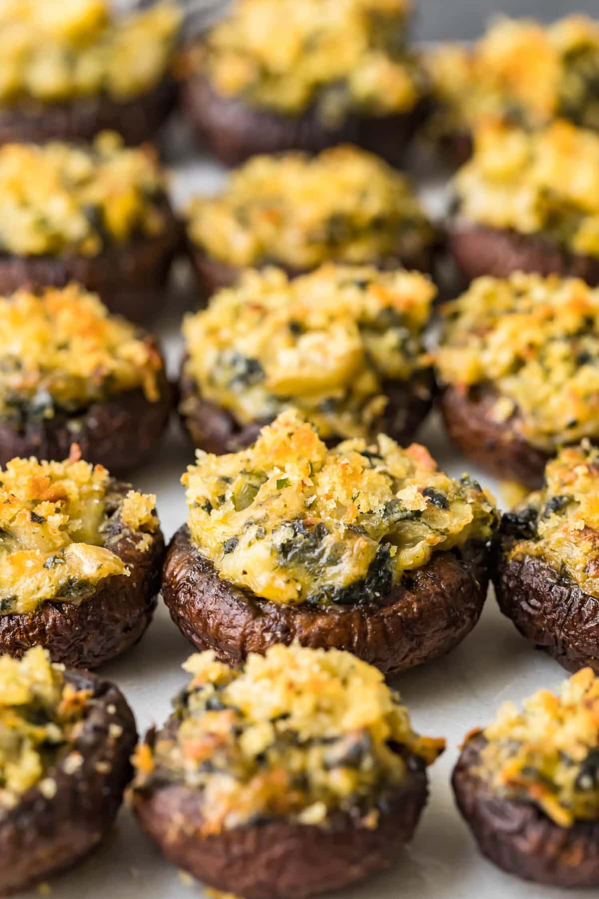 Three rows of Spinach Stuffed Mushrooms