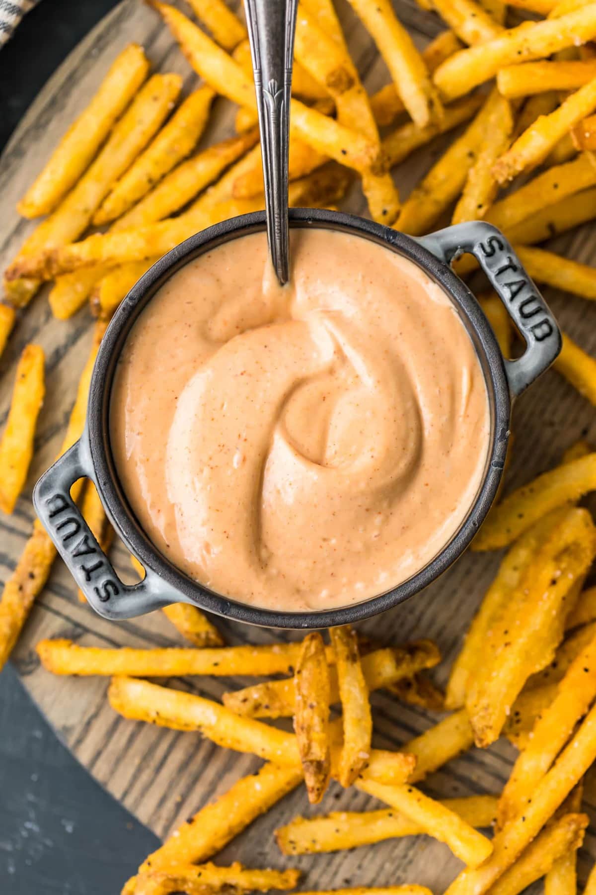 Top shot of dip served with French fries