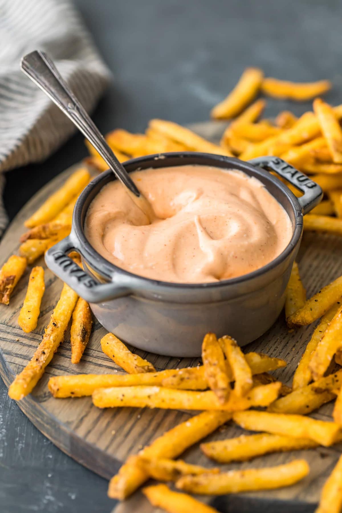 A spoon in a bowl of dip