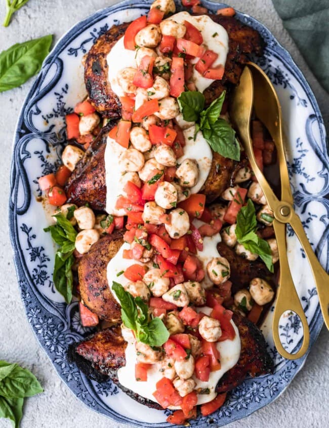 grilled caprese bruschetta chicken on a plate